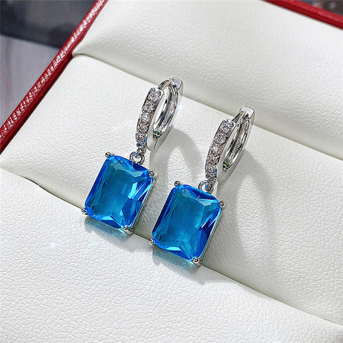 Anti-Tarnish Silver Plated Blue Rectangular American Diamond Studded Crushed Ice Cut Drop Earrings - Wholesale
