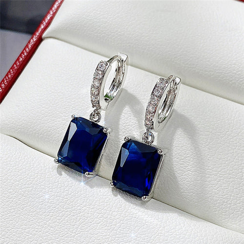 Anti-Tarnish Silver Plated Navy Blue Rectangular American Diamond Studded Crushed Ice Cut Drop Earrings - Wholesale