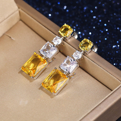 Anti-Tarnish Silver Plated American Diamond Studded Yellow Geometrical Crushed Ice Cut Drop Earrings - Wholesale