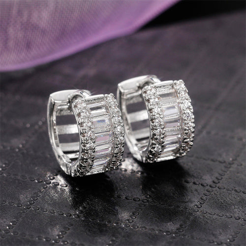 Silver Plated American Diamond Studded Anti Tarnish Yellow Crushed Ice Cut Stud Earrings