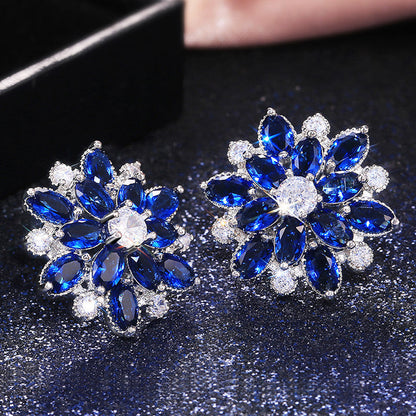Anti-Tarnish Silver Plated American Diamond Studded Navy Floral Stud Earrings - Wholesale