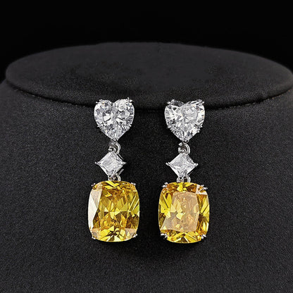 Anti-Tarnish Silver Plated American Diamond Studded Yellow Heart Crushed Ice Cut Drop Earrings - Wholesale