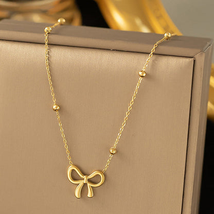 Anti-Tarnish Stainless Steel Gold-Plated Infinity Bow Pendant - Wholesale